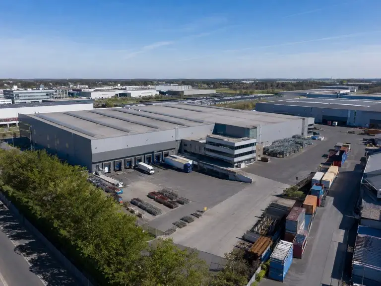 Water treatment equipment manufacturing facility exterior with 70,500 sqm production buildings