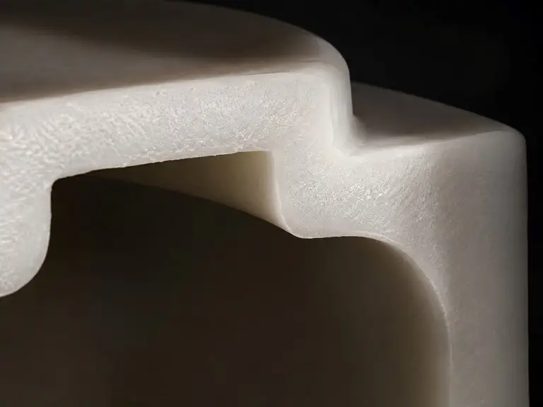 Cross-section diagram of rotomolded LLDPE tank wall - seamless one-piece construction, uniform wall thickness