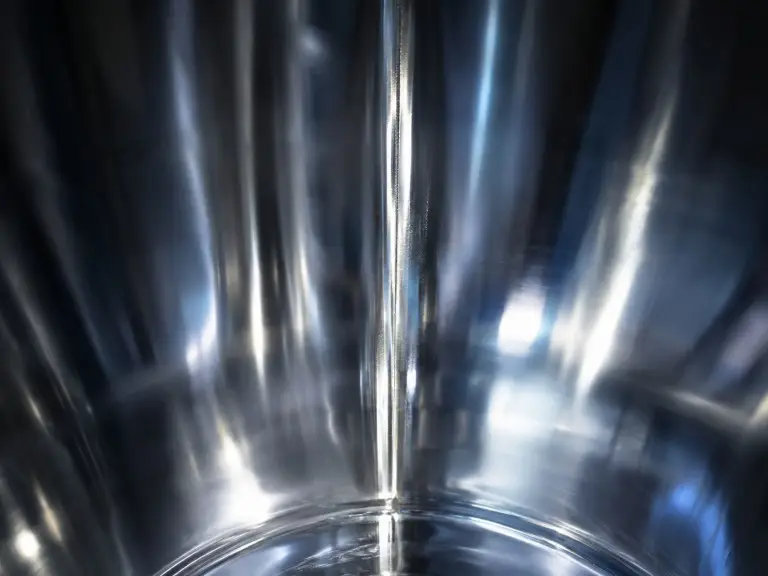 Electropolished SUS316L stainless steel tank interior showing passivated weld seam and food-grade surface finish