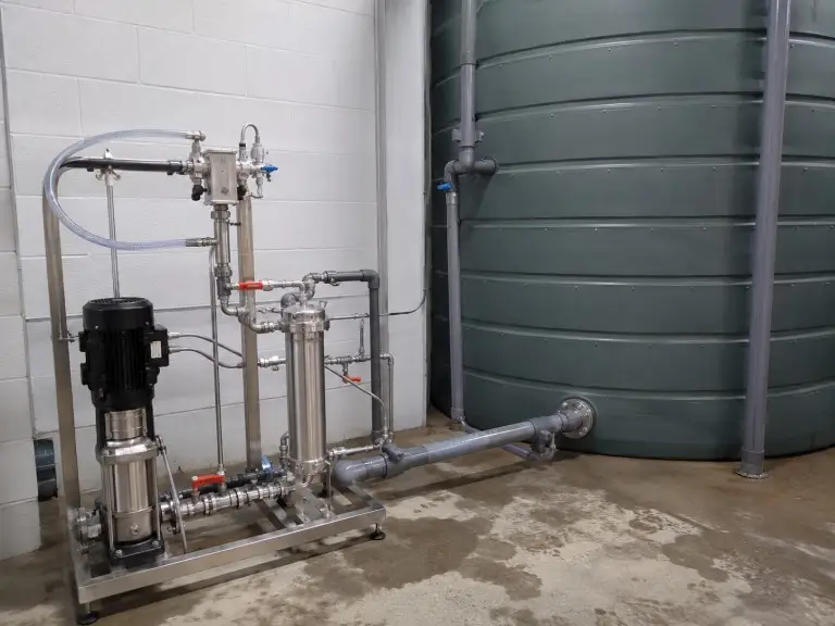 External SCII ozone pump unit with pipe loop connections to water tank