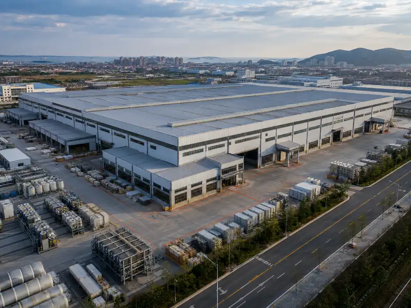 Hiju factory exterior in Qingdao industrial facility aerial view daytime
