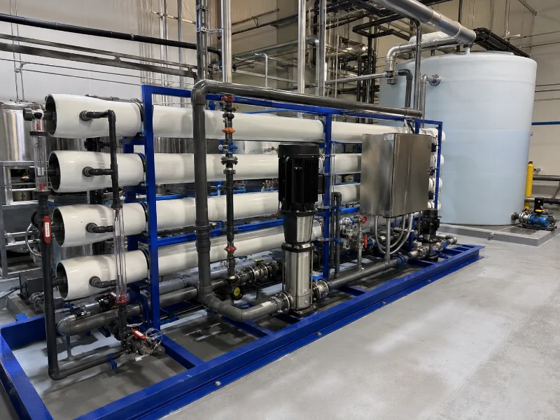 Industrial reverse osmosis installation with feed and permeate sampling points used to validate rejection performance